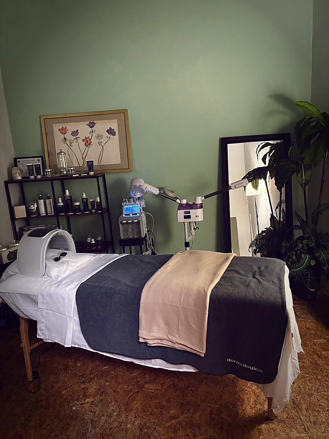 Treatment room with skincare equipment and plants